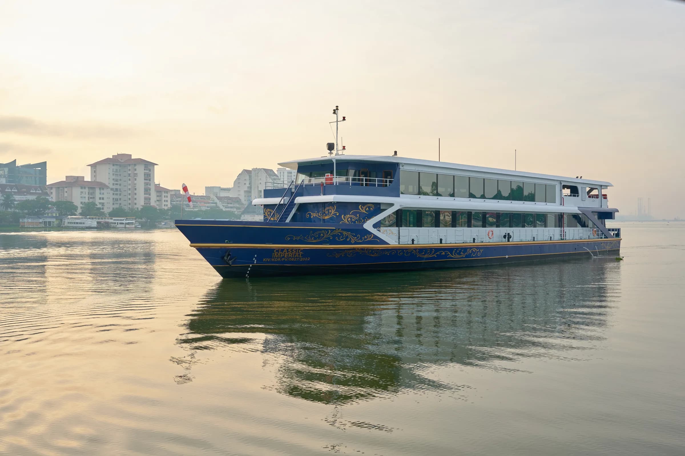 Classic Imperial reflected on the water at dawn