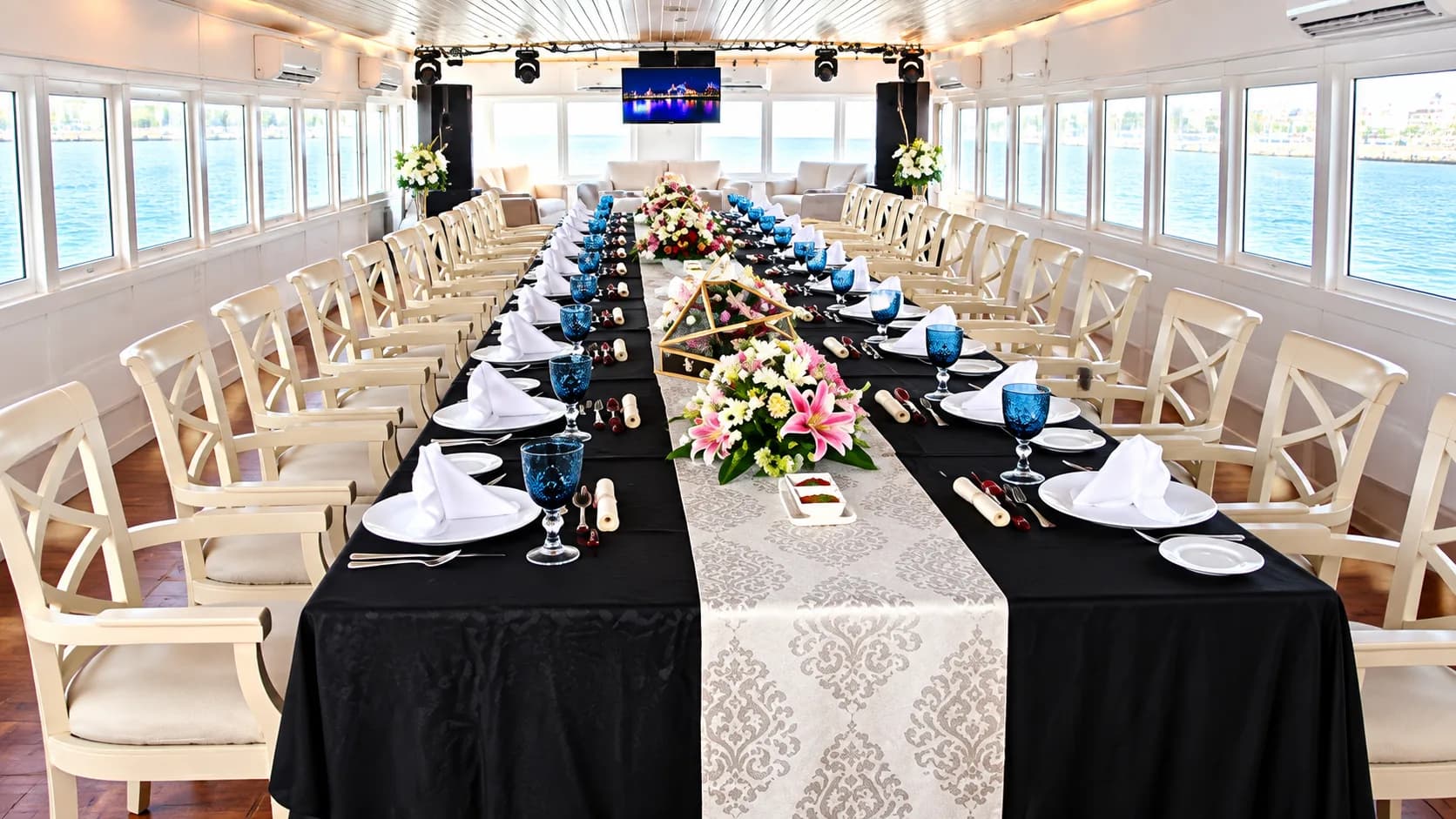 Long dinner table aboard Classic Paradise