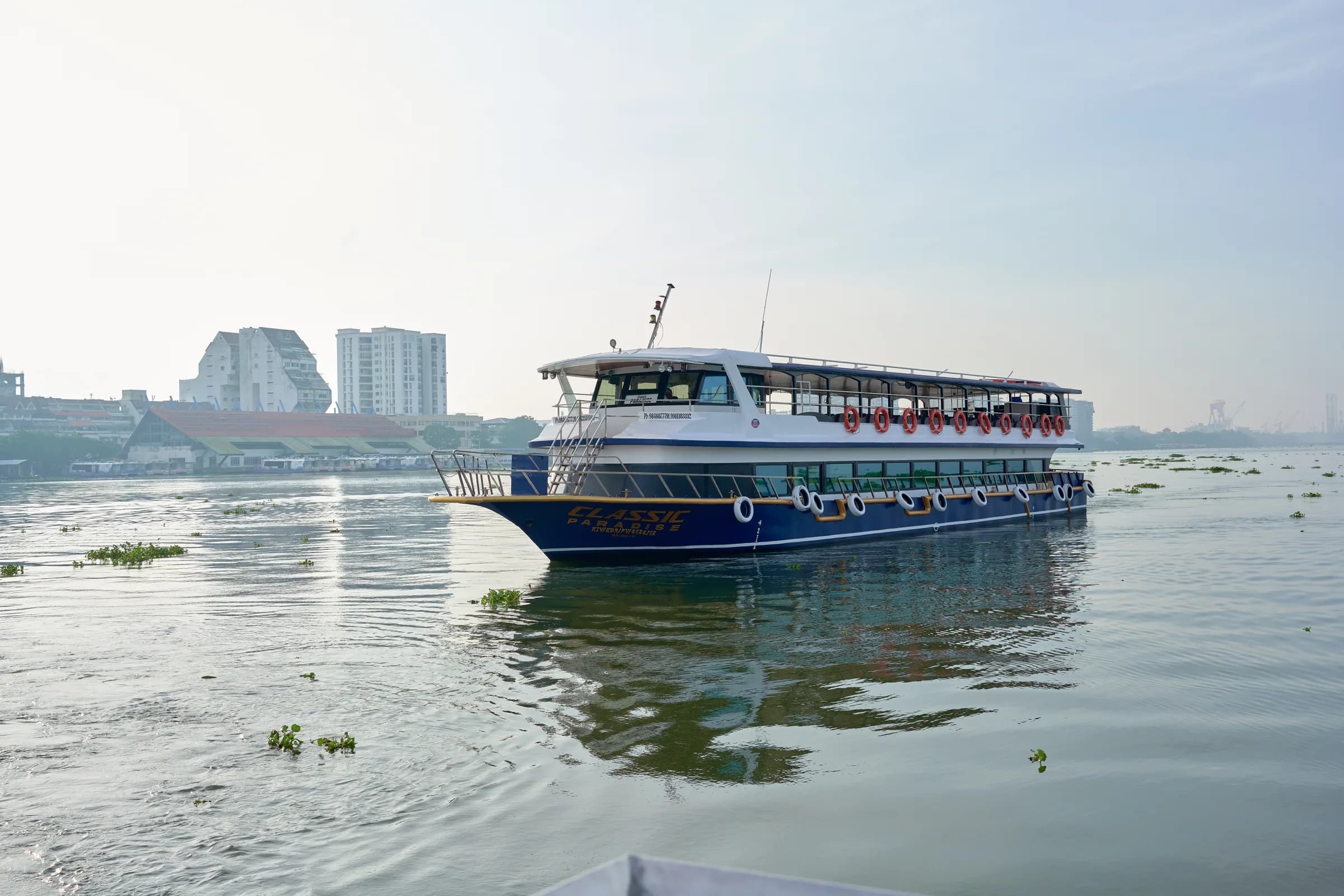 Classic Paradise near Marine Drive with the Kochi skyline